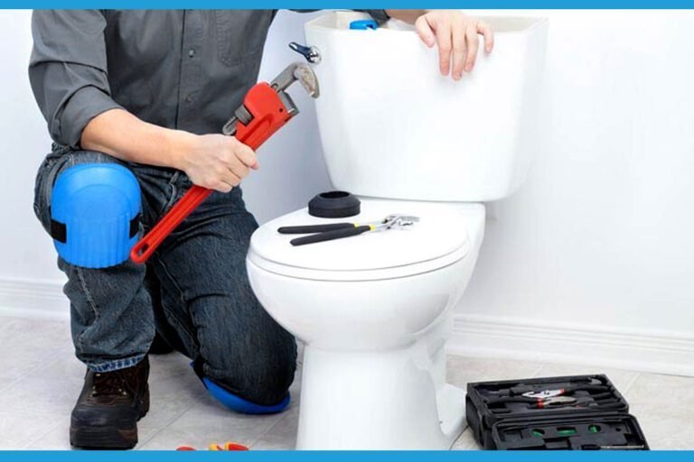 Plombier professionnel réparant une chasse d'eau défectueuse à Paris 19 - Service de dépannage WC efficace.