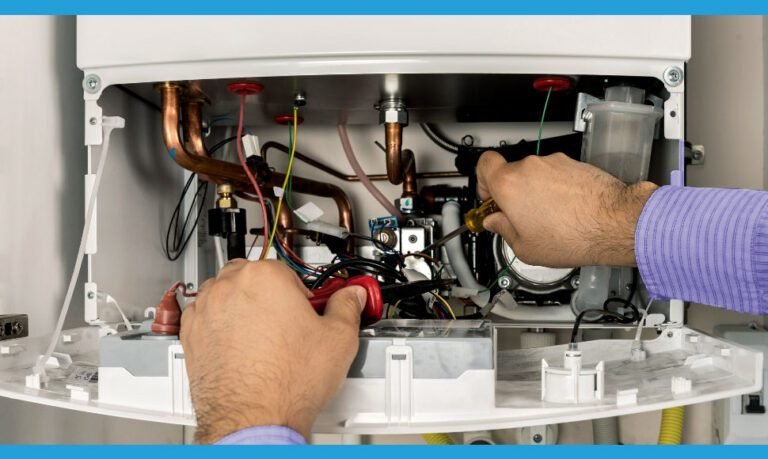 Technicien en train d'installer une chaudière moderne, service de qualité par Desrech Fabbio Plombier Paris 19.